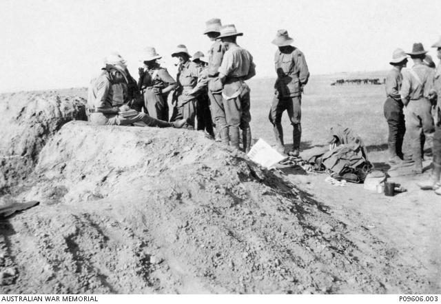 Members of the 7th Light Horse Regiment vote in the 1917 Federal Election at a desert outpost in the Weli Sheikh Nuran area. P09606.003