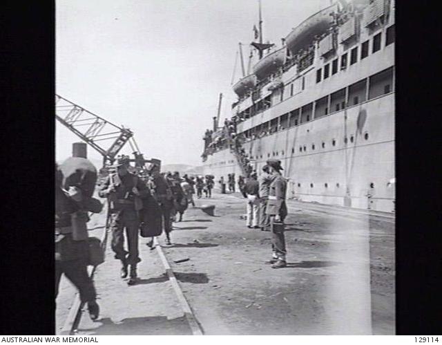 Soldiers disembarking the Duntroon at Kure in Japan.