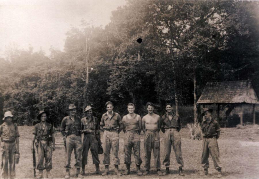 A group of Semut operatives at a camp at the top of the Baram River. The operation leader, Toby Carter, is fifth from the left.