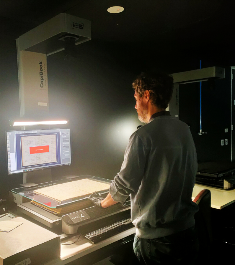 Digitising the book using a Copibook scanner.