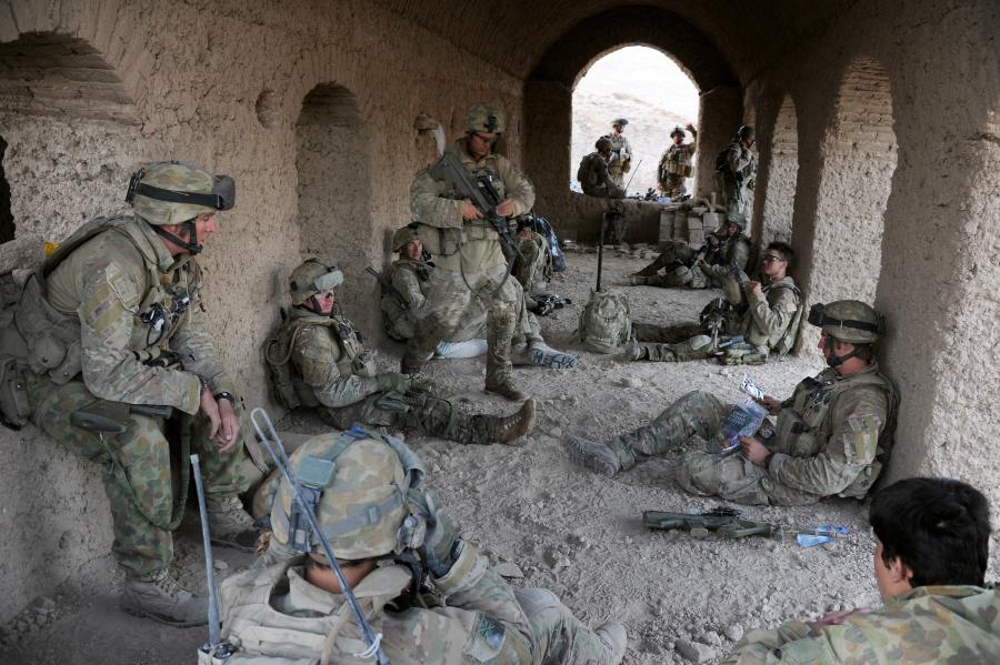 Australian soldiers take a break in a compound on the outskirts of the town of Saghaytu.
