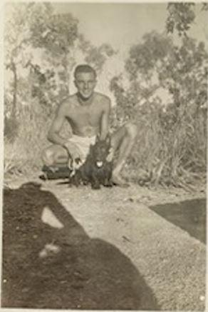 Vern with Scotty, one of their mascots at Fenton.