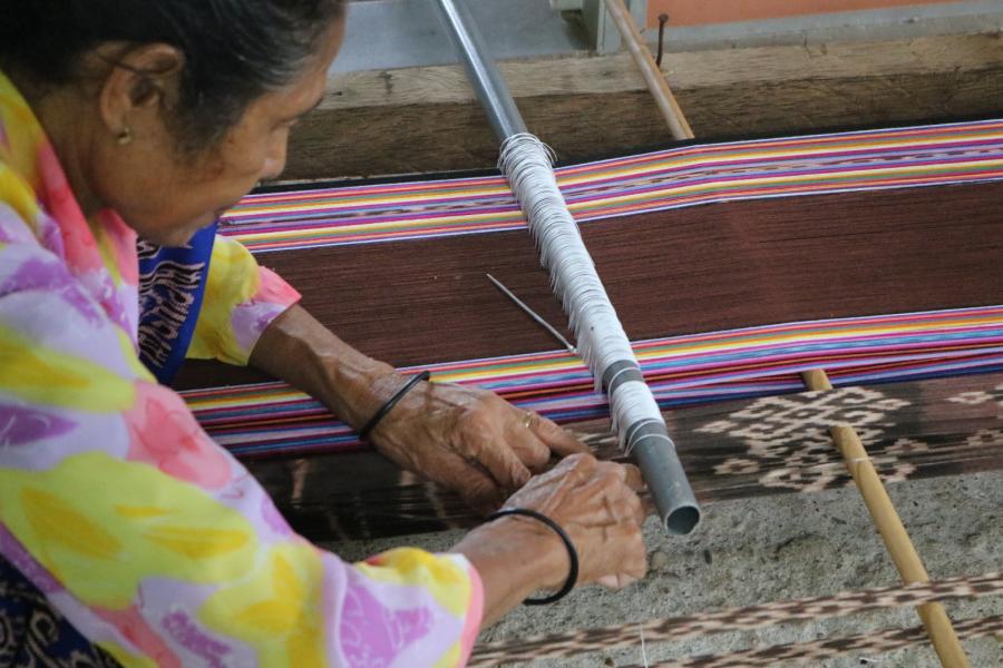 Founding member of LO’UD, Filomena da Cruz weaving Tais Naeleki