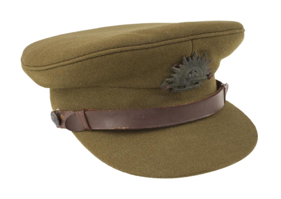 Peaked officer’s cap worn by official war artist Lieutenant Alan Moore at the liberation of Belsen concentration camp. Donated by Mrs Alison Moore in memory of Alan Moore