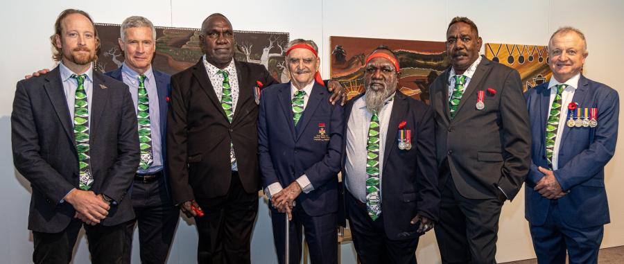 David Palmer, Derek Payne, Owen Thomas, Keith Payne VC AM, Peter Thomas, Mark Nodea and Major Mac Jensen OAM RFD JP at the opening of the 2024 Napier Waller Art Prize exhibition