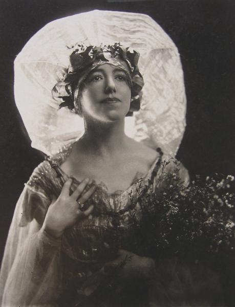 Photograph of artist Hilda Rix Nicholas, c. 1920, dressed as "the spirit of the bush".