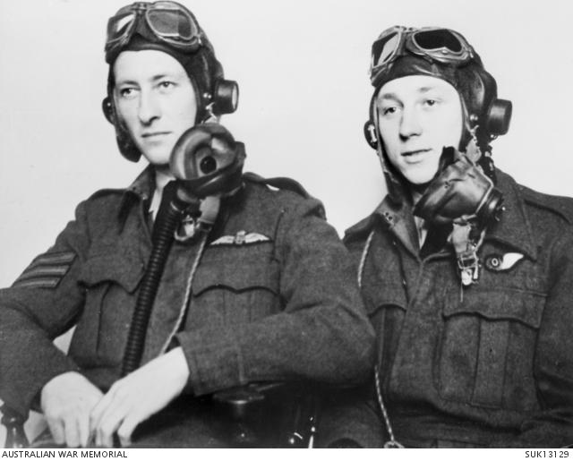 Black and white photograph of two young Australian flying officers in uniform