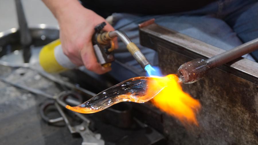 Glass artist, Annette Blair, fabricating leaves for Quiet Skies in Glassworks Hotshop, 2024. Courtesy of Canberra Glassworks.