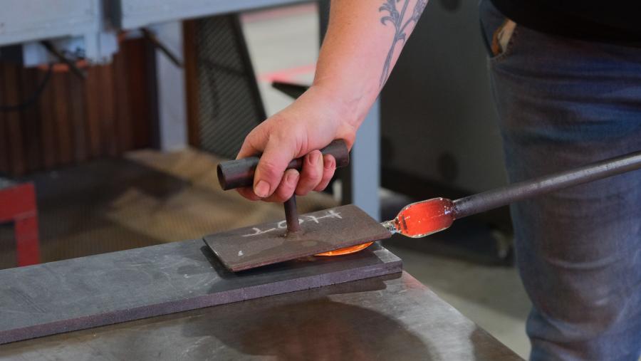 Glass artist, Annette Blair, fabricating leaves for Quiet Skies in Glassworks Hotshop, 2024. Courtesy of Canberra Glassworks.