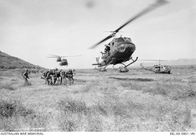 Iroquois helicopters of No. 9 Squadron RAAF prepare to land and pick-up soldiers from the 3rd Battalion, 52nd Regiment of the 18th Division of the Army of the Republic of Vietnam (ARVN).