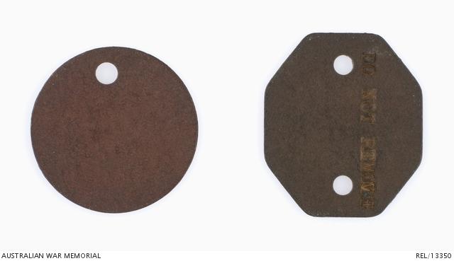 Reverse of Canadian identity discs issued to an Australian.