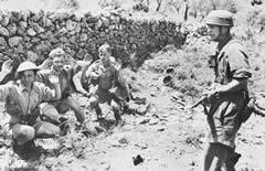 British Commonwealth troops surrendering to German paratroops