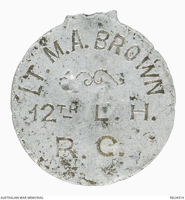 disc marked with LT M A BROWN 12th L H R C