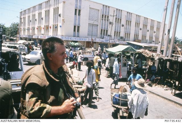 "Portrait of George Gittoes in Mogadishu, Somalia, 1993, by an unknown photographer P01735.432"