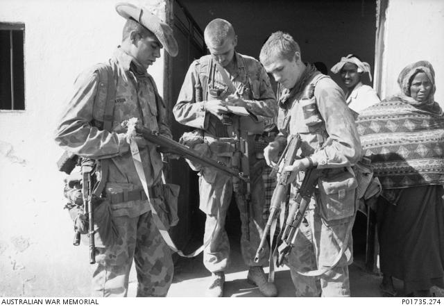 "George Gittoes, Confiscated guns, Baidoa, Somalia, 21 March 1993 P01735.274"