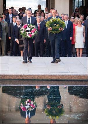 a photograph showing the Honourable Tony Abbott MP, Prime Minister of Australia, and the Honourable Bill Shorten MP, Leader of the Federal Opposition, each lay a wreath during the Last Post Ceremony held to mark the opening of a new Parliament.