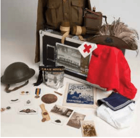 Memorial box contents including helmet and military uniforms