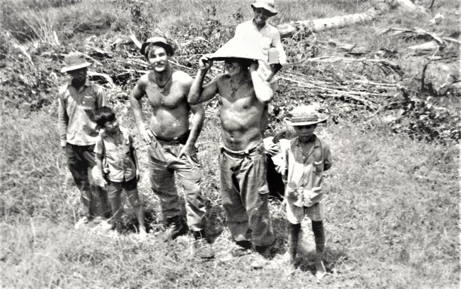 Roy Dodd and Rix Thomas with the locals.