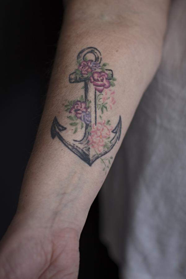 Deb’s anchor tattoo, a tribute to her years of Naval service.