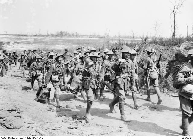 Australian machine gunners returning from the front line trenches to their billets, in France.