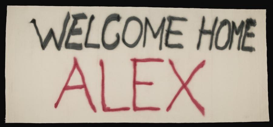 Welcome home banner for Corporal Ali 'Alex' Khalil