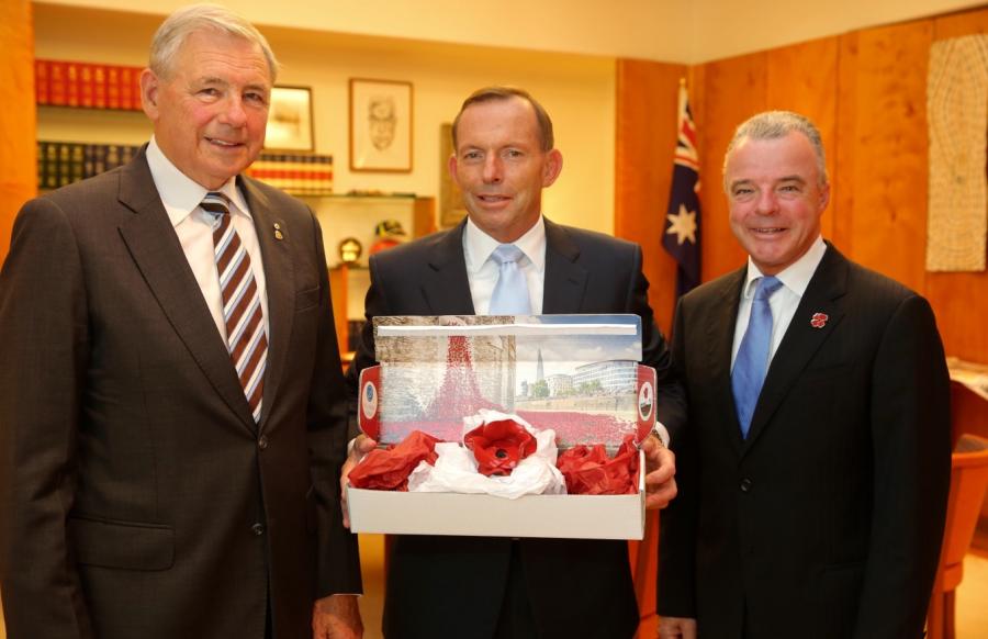 Handover of ceramic poppies from the Tower of London’s Blood Swept Lands and Seas of Red centenary installation  with Ken Doolan, Prime Minister Abbott and Brendan Nelson