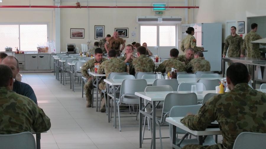 Soldiers in uniform eating at the Mess, Al Minhad Air Base