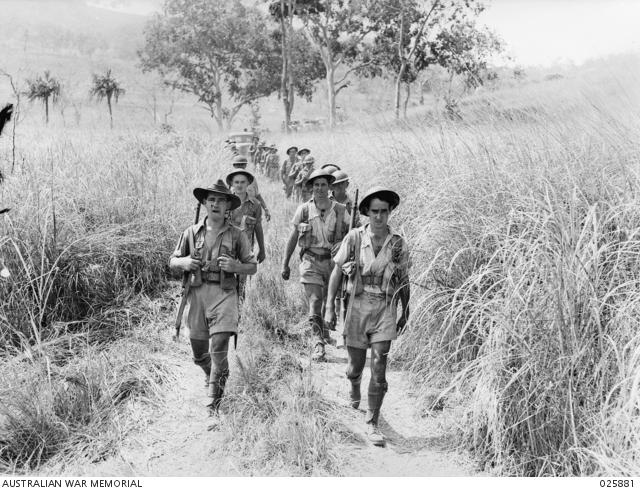 PORT MORESBY, PAPUA 1942-07-11. AUSTRALIAN INFANTRY MARCHING ALONG BUSH TRACKS AS THEY MOVE UP TO &quot;ATTACK&quot;