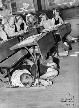 Children at Brompton Primary School, Adelaide, participating in an air raid practise.