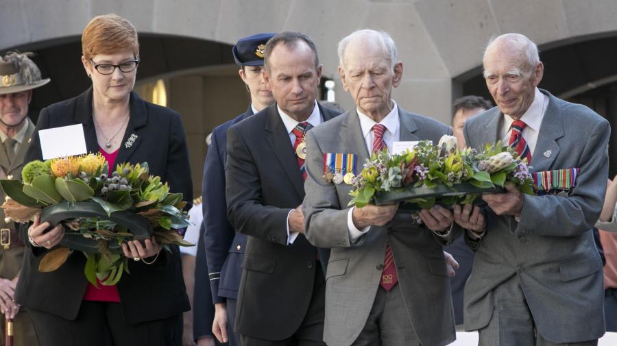 Bill Grayden laying a wreath with Les Cook.