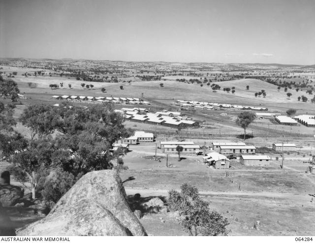 Looking west showing the compounds of the 12th Australian Prisoner of War Camp at Cowra, with the Group Headquarter buildings in the foreground.