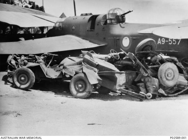  A badly-damaged Australian army jeep under the tail of A9-557 after its crash landing at Tadji, New Guinea, on 21 January 1945.
