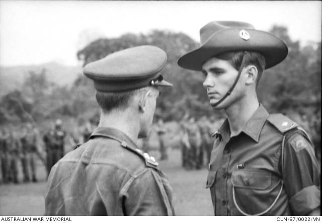 Dave Sabben receives a Mentioned-in-Despatches rosette from the former Commander of the 1st Australian Task Force, Brigadier O. D. Jackson.