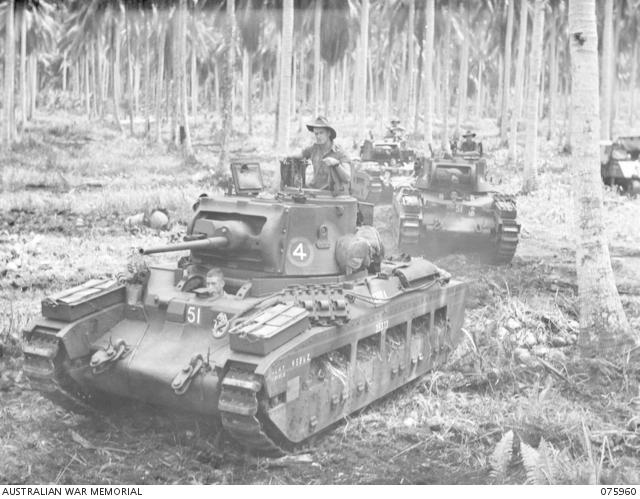 Troopers of the 2/4th Armoured Regiment manoeuvring their Matilda Tanks among the coconut palms near their camp, New Guinea