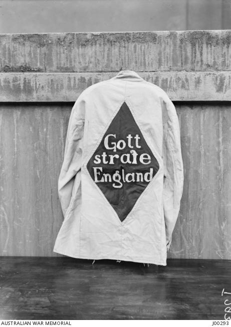 Coat with "Goffe Strate England" written on the back
