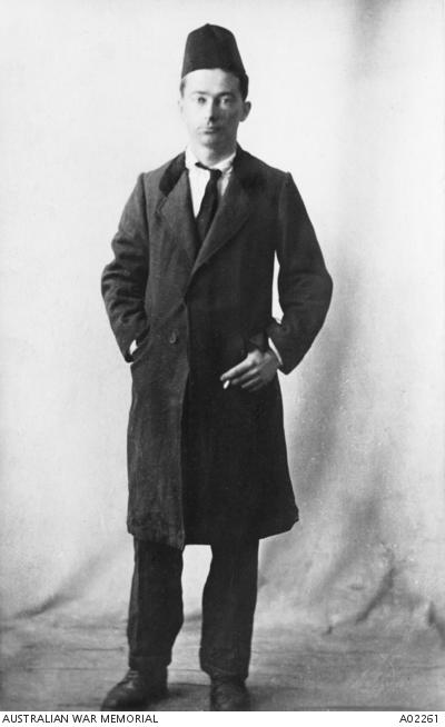 Captain Thomas White in 1918, dressed in the disguise he used during his escape. A02261