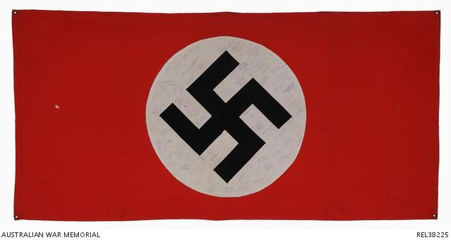 The centre of the flag has the service numbers and names or signatures of members of the 2/2nd Machine Gun Battalion.