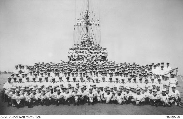 Group portrait of officers and crew of HMAS Sydney after the successful action against the Italian Cruiser Bartolomeo Colleoni on 19 July 1940.