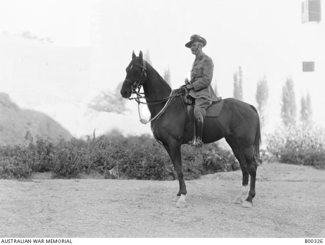 A portrait of General Sir Harry Chauvel and his charger.