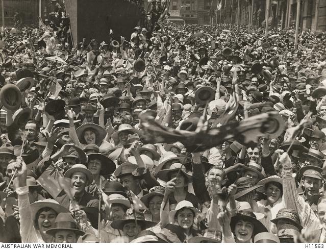 A crowd in Martin Place, central Sydney, celebrate the news of the signing of the armistice.