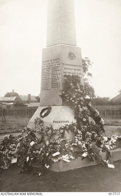 A WWI War Memorial after an Anzac Day ceremony.
