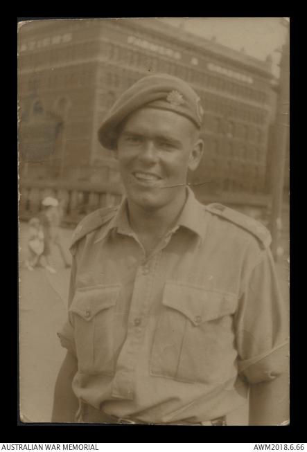 Lieutenant Cresswell Chalmers, Services Reconnaissance Department, Z Special Unit, in Sydney meeting his wife and her brother on his first day back in Australia after service in Dutch Borneo during the Second World War.