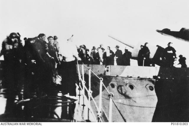 The British destroyer HMS Defender (left) alongside the Australian destroyer HMAS Waterhen