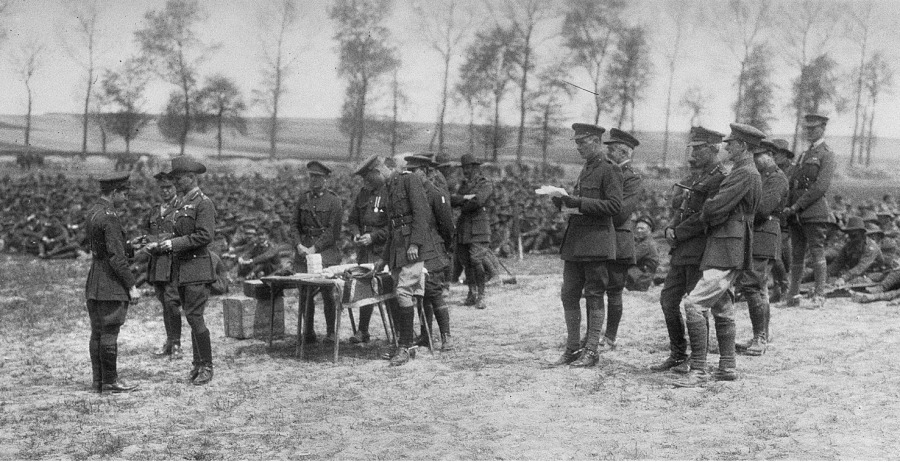 General Sir William Riddell Birdwood decorating an officer for bravery in the first attack on the Hindenburg Line. 