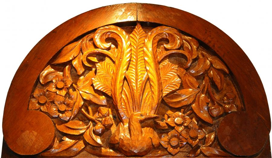 One of the panels carved by John Grant