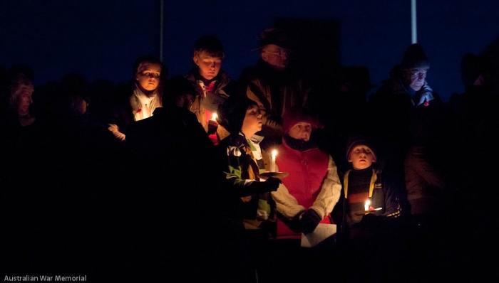 A crowd gathers at Anzac Day dawn service