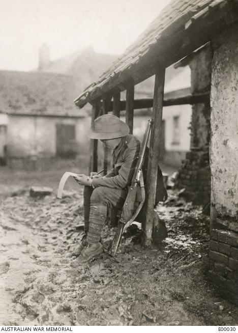 Soldier writing a letter