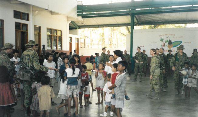 Australian peacekeepers at an orphanage in East Timor.