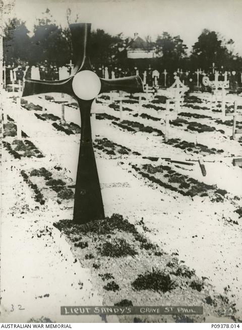 The grave of Lieutenant James Lionel Montague Sandy AFC.