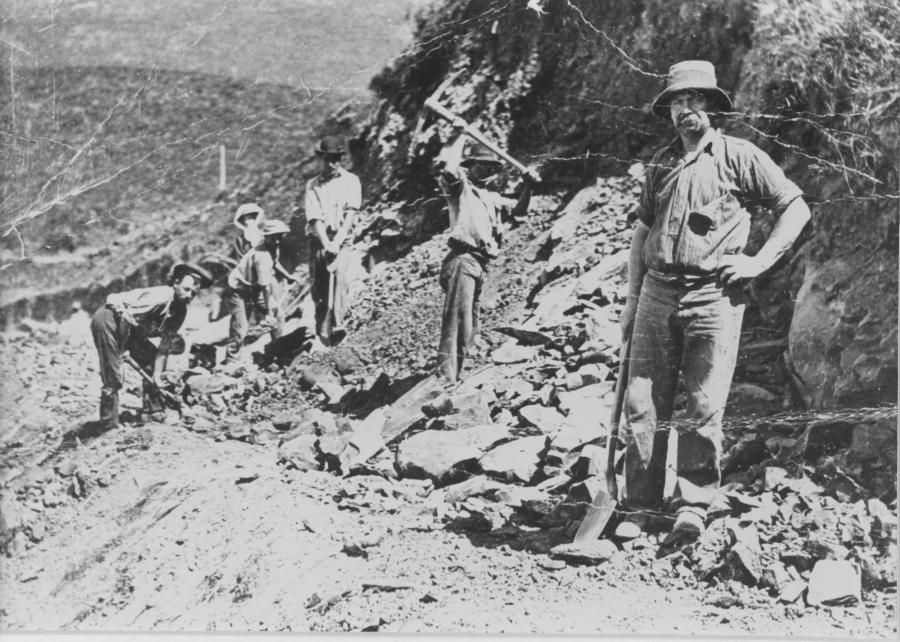 Men working on the Great Ocean Road